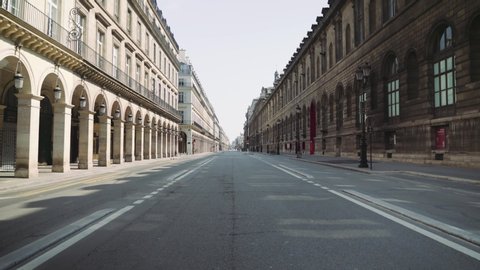 Paris, France / 04 13 2020 : Slow travelling shot on deserted Rivoli street during coronavirus / Covid19 lockdown in Paris, France 4K