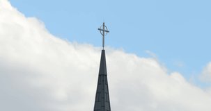 Time Lapse of Clouds Over Christian Church Cross on Steeple