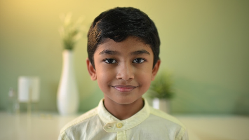 Beautiful Portrait of asian boy looking at camera with smile face in 4K UHD | Shutterstock HD Video #1050564154
