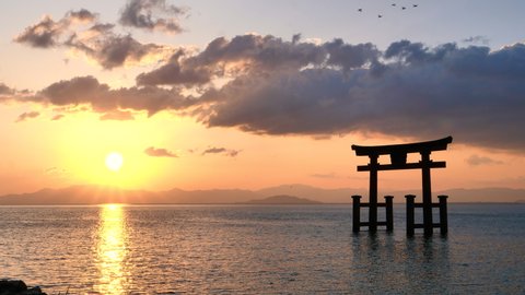 Shiga Prefecture, Japan: The early morning view of the torii gate on the Lake Biwa. 