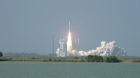 CAPE CANAVERAL, FL March 2020 - Atlas V Rocket lifts off from launch pad 41 at Kennedy Space Center to deliver a U.S. Air Force communications satellite to orbit in space. Includes audio.