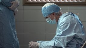 Exhausted health care worker sitting down - Powered by Shutterstock - Get 15% off with code: PIKWIZARD15