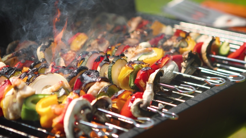 Overcooked and burned shashliks on hot barbecue grill. Royalty-Free Stock Footage #1050621223