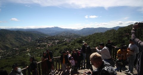 BAGUIO, PHILIPPINES - FEB 10: Tourists enjoy the overlook at Mines View Park Baguio on Feb 10, 2020. The landmark overlooks the abandoned gold and copper mines of Itogon.