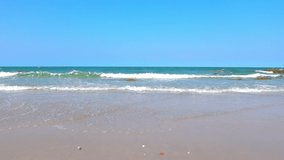 View of beach sea with blue sky in the summer. 4K UHD, Video Clip.