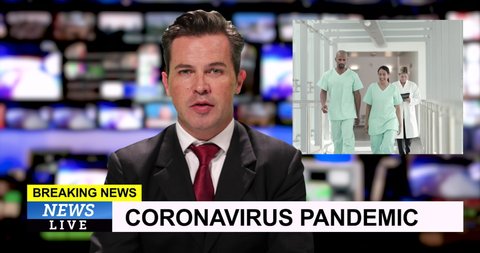 MS male television anchor at news desk presenting breaking news during Coronavirus Pandemic