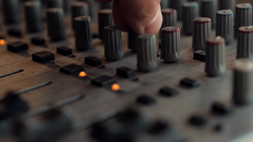 Soundboard Pads On TV Station.Engineer Press Key Buttons On Control Desk Recording Studio.Sound Engineer Moving Sliders In Radio Station.Sound Designer Used Digital Audio Mixer In Production Studio | Shutterstock HD Video #1050677029