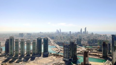 Aerial (drone) shot of Abu Dhabi city skyline and famous skyscrapers  Downtown Abu Dhabi on a beautiful sunny day