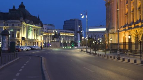 Moving shot of empty city centre streets due to covid-19 pandemic quarantine in Eastern Europe, Bucharest at dusk