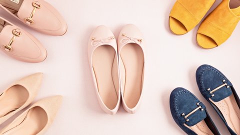 Stop motion with female shoes collection of different colors and styles. Shopping, online shop, fashion blog, urban style concept. Flat lay top view