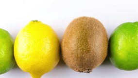 High quality slow motion video of lime, lemon and kiwi fruits.