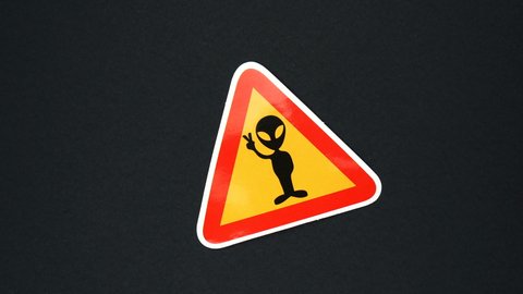 ALIENS, UFO warning sign. Stop motion animation.