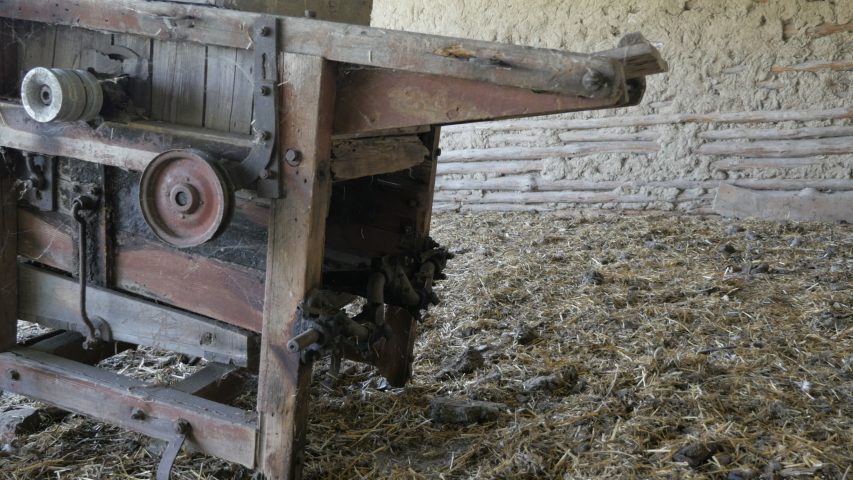 Slider Shot Of Antique Farm Equipment 