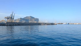 port of palermo crane portaier seen from the sea