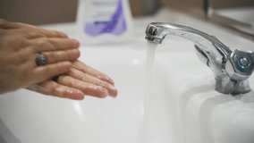 Washing hands frequently to prevent coronavirus epidemic. Close-up video of hand washing with plenty of soap. Hand hygiene to prevent the spread of the virus. Covidien-19. Corona.