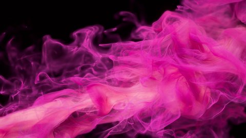 Pink color paint ink drops in water slow motion art background with copy space. Inky cloud swirling flowing underwater. Abstract smoke fluid liquid animation isolated on black alpha channel