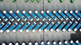 Multiple Drone Aerial Shot Pack Of Bus Station Filled With Buses