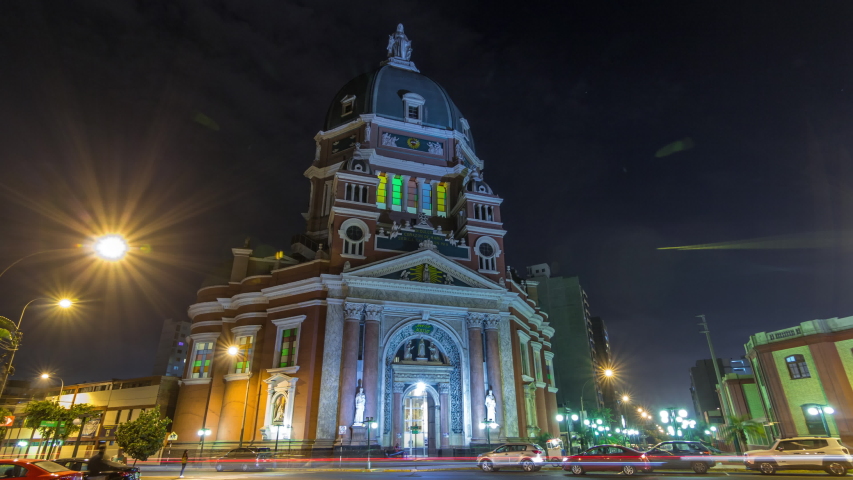 Exterior of the Immaculate Heart of Mary Church illuminated at night timelapse hyperlapse. Important religious complex of the Historical Center of Lima on Antonio Jose de Sucre avenue, Peru