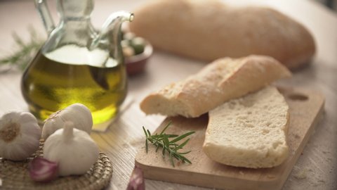 rustic bread and olive oil ready to make toasts