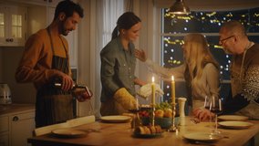 Happy Multi Generation Family of Celebrating together, Gathering around the Table with Delicious Dinner Meal. Young Mother Takes Dish out of Oven, Young Father and Grandparents Admire How Delicious Ca - Powered by Shutterstock - Get 15% off with code: PIKWIZARD15