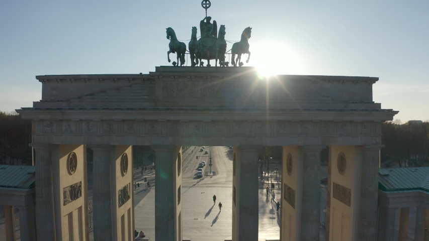 Flying around the Brandenburg Gate in Berlin Germany at sunset Royalty-Free Stock Footage #1050797188