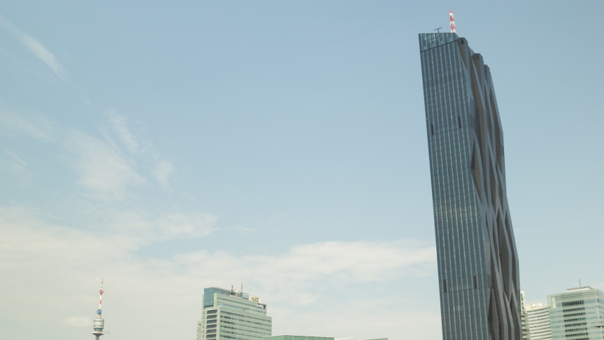 Camera tilts down from skyscrapers in Vienna