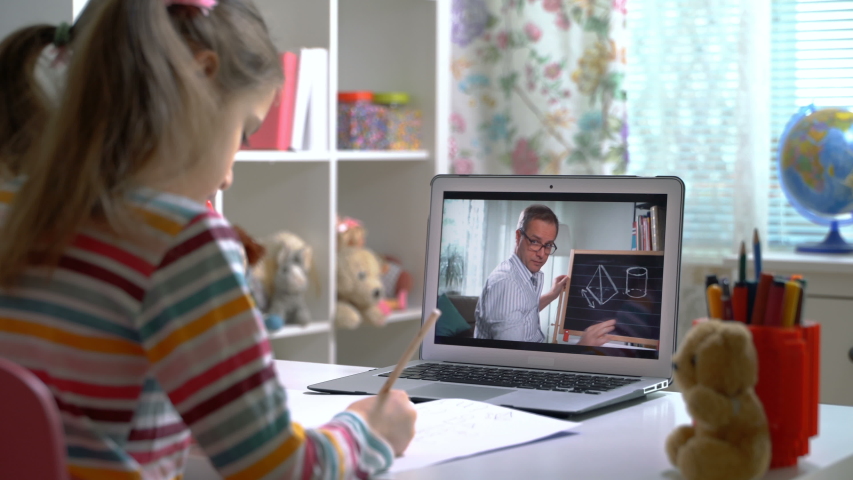 Middle-aged man distance teacher online tutor conferencing on laptop communicate with pupil by webcam video call e-learning. Home quarantine distance learning and working at home. Royalty-Free Stock Footage #1050807574