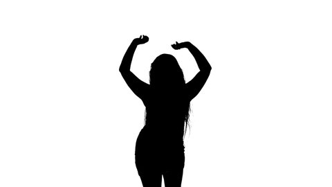 black silhouette on a white background, young beautiful woman dancing belly dance, oriental dance. Medium long shot