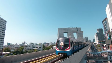 BTS Skytrain in Bangkok, passing train in the background of the city. Thailand Bangkok - April 2020