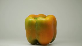 Yellow Bell Pepper Rotating and Spinning in The Turntable - Close Up Shot - Powered by Shutterstock - Get 15% off with code: PIKWIZARD15