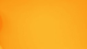 Abstract color animation of moving lemon on orange background
