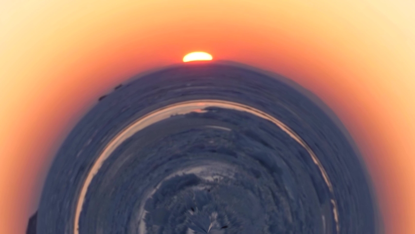 Spherical panorama of a beautiful sunset with the movement of clouds