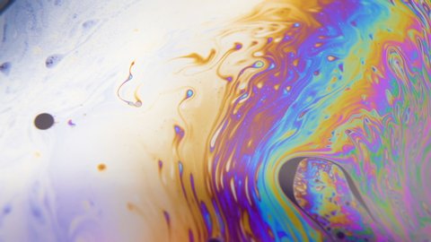 Vibrant multicolored rainbow fluid moving around. Subconscious concept. Relaxation background