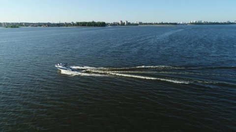 Beautiful Boat Floating on the Volga River In the Direction of the Bright Sun View From Above. City. Tatarstan.
