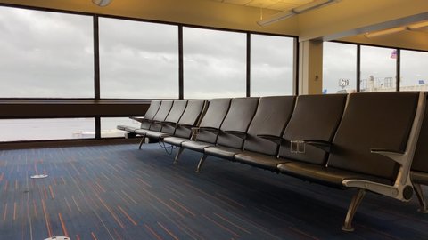 Boston, Massachusetts / USA - April 9, 2020: Nearly Empty JetBlue Gate Area At Boston Logan International Airport During COVID-19 Pandemic