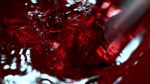Super Slow Motion Detail Shot of Pouring Red Wine at 1000fps.