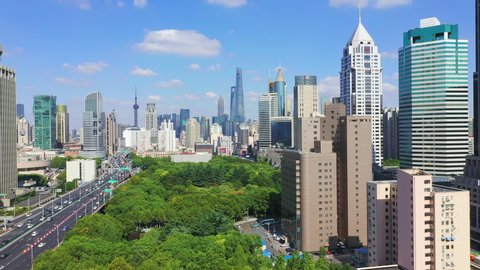 Drone shot: Real Time ,Moving Up, 4K Aerial view of Shanghai skyline at sunny day, China. 