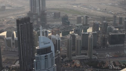 Dubai, UAE - December 17th 2019: time lapse of Dubai, view from Burj Khalifa At The Top 123th level on sunrise