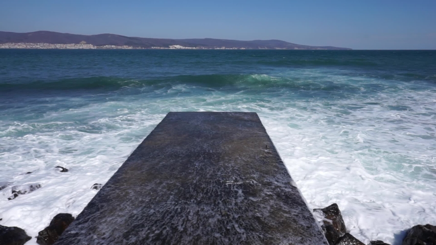 Relaxing water movement on a beton unterground | Shutterstock HD Video #1050933604