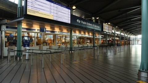 Amsterdam, Netherlands, April 2020. Deserted train ticket booths at Schiphol airport during corona crisis.