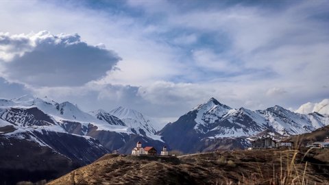 
Timelapse as clouds float over a church in the Caucasus mountains