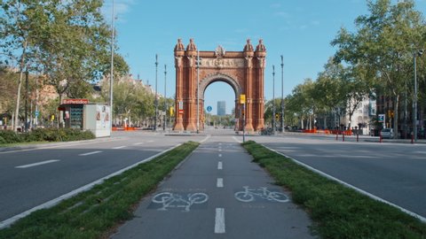 4K Barcelona, Spain; April 2020: Triumphal Arch, deserted streets and bikeway during state of alarm - COVID19 pandemic