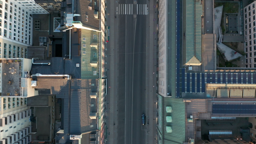 Empty city street during Coronavirus Covid-19 outbreak quarantine. Aerial view. | Shutterstock HD Video #1050973375