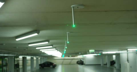 Parking guidance system turning from green to red when car is parked in parking lot