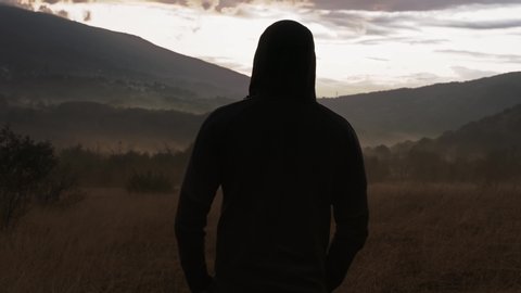 Lonely Hooded Man Enjoying Nature At Sunset In The Misty Mountains Youth Depression Hiking Lifestyle Slow Motion 8k