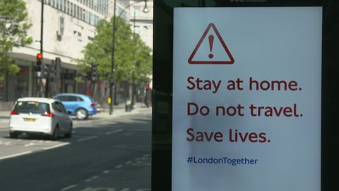 London, UK - April 21 2020: Coronavirus Outbreak London lockdown - Stay at Home advert on TfL bus shelter