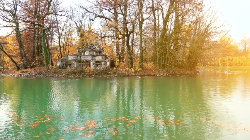 Trianon fountain in park. Sculpture allegorically represents the rivers Taro and Parma. Ducal Park, also known simply as public garden, is historical park in Parma, Italy.