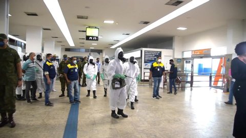 RIO DE JANEIRO (BRAZIL), APRIL, 23, 2020:military of the navy of brazil, corps of marines carried out disinfection of the bus station in rio de janeiro