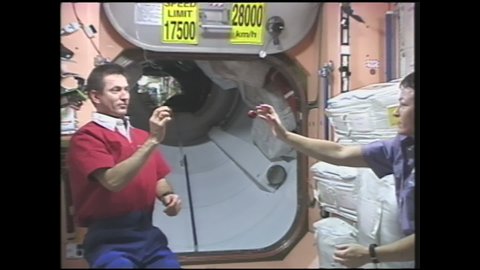 1990s: Astronauts bounce rubber balls against each other in zero gravity. Astronauts bounce wooden balls against each other in zero gravity.