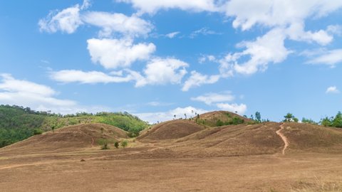 Golden Grass or Bald Hill mountain, scenic park in Ranong, Thailand; zoom out - Time Lapse